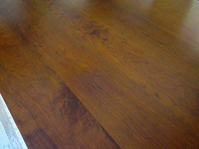 The damaged surface was repaired and restored to match the existing finish.
