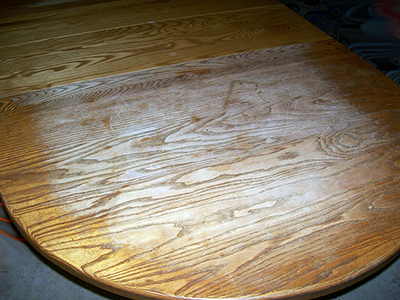 After years of service as the family table, the finish was worn and dull.